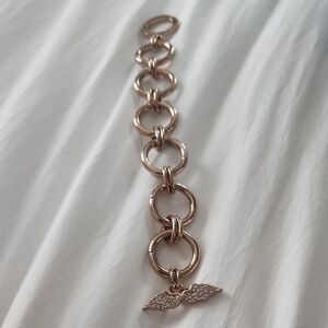Elegant Gold-Tone Bracelet with Wing Charm